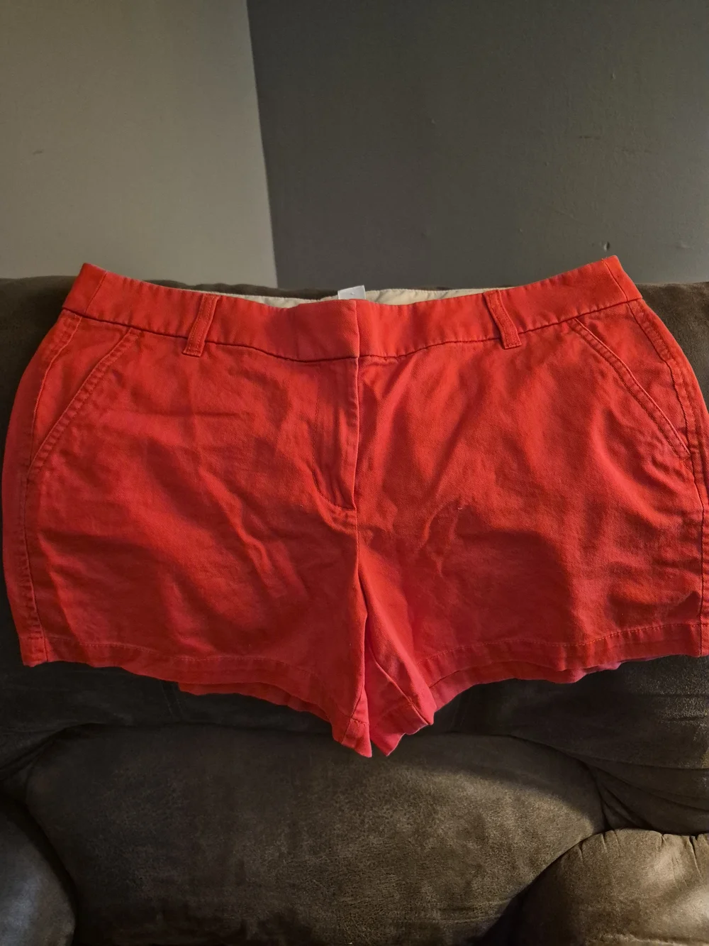 vibrant J.Crew coral 4-inch chino shorts featuring a classic mid-rise fit
